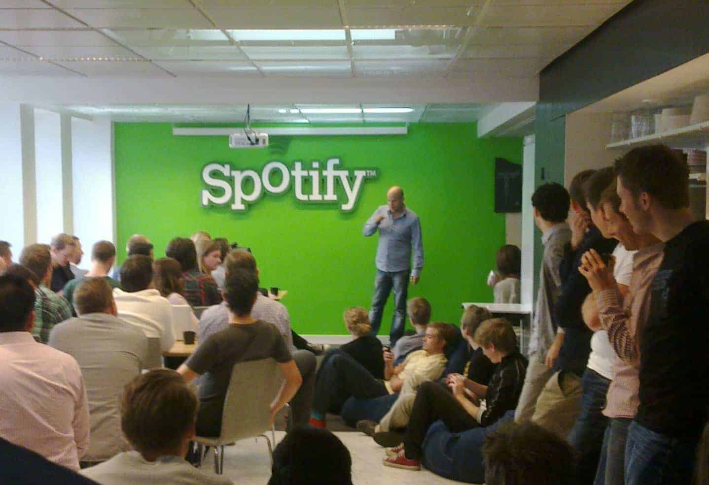 Spotify going public through a direct public offering https://commons.wikimedia.org/wiki/File:Daniel_Ek_addressing_Spotify_staff.jpg